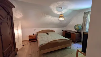 Ein Bett oder Betten in einem Zimmer der Unterkunft Charlottes Waldresidenz