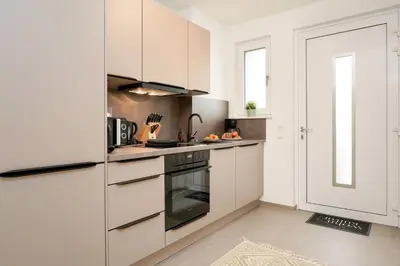 Küche/Küchenzeile in der Unterkunft Wohnkultur - Ferienhaus für 10 mit Garten und 5 Schlafzimmern