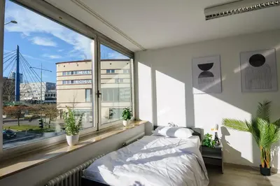 Ein Bett oder Betten in einem Zimmer der Unterkunft MZK Maier LongStay Central