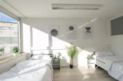 Ein Bett oder Betten in einem Zimmer der Unterkunft MZK Maier LongStay Central