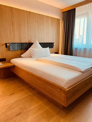 Ein Bett oder Betten in einem Zimmer der Unterkunft Hotel Krone