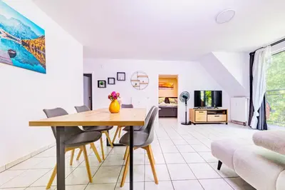 Ein Sitzbereich in der Unterkunft Zentrales City Appartement Worms
