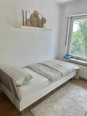 Ein Bett oder Betten in einem Zimmer der Unterkunft REHBLICK Ferienwohnung