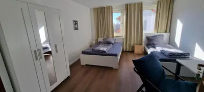 Ein Sitzbereich in der Unterkunft Book your Room in Darmstadt City