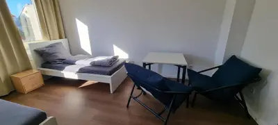 Ein Sitzbereich in der Unterkunft Book your Room in Darmstadt City