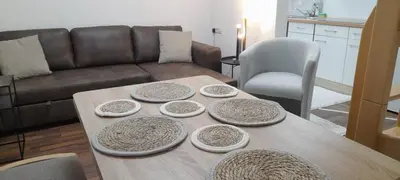 Ein Sitzbereich in der Unterkunft NEU Casa Ludi Pforzheim Eutingen gute Wohngegend direkte Buchung möglich keine Freigabe erforderlich inklusive Balkon Terrasse und Tiefgaragenparkplatz im Haus