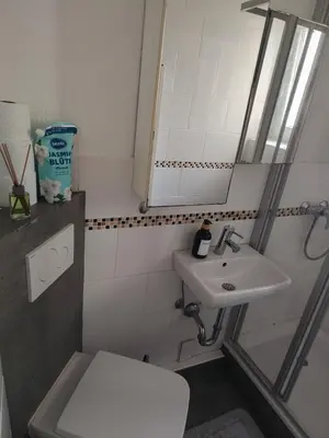 Ein Badezimmer in der Unterkunft Dorey Home HN2 - Zentral gelegen