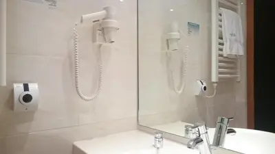 Ein Badezimmer in der Unterkunft Hotel Avisa