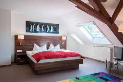 Ein Bett oder Betten in einem Zimmer der Unterkunft Hotel Avisa