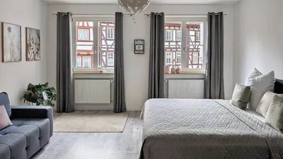 Ein Bett oder Betten in einem Zimmer der Unterkunft Altstadtzauber Apartments Miltenberg