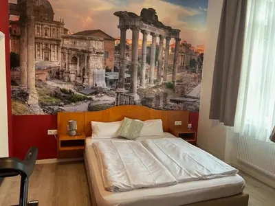 Ein Bett oder Betten in einem Zimmer der Unterkunft Hotel - Restaurant Zur Linde