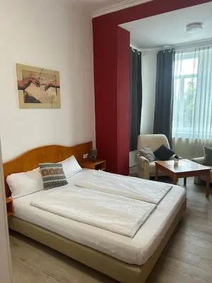 Ein Bett oder Betten in einem Zimmer der Unterkunft Hotel - Restaurant Zur Linde