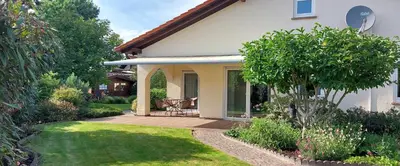 Ein Garten an der Unterkunft Ferienwohnung Catus