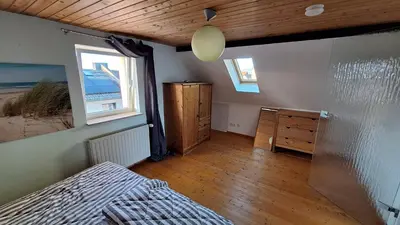 Ein Bett oder Betten in einem Zimmer der Unterkunft Cozy apartment with S-Bahn connection to Frankfurt