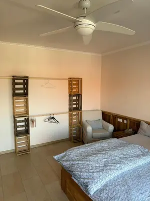 Ein Bett oder Betten in einem Zimmer der Unterkunft Stilvolle Wohnung mit Parkplatz