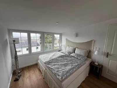Ein Bett oder Betten in einem Zimmer der Unterkunft Wohnen mit traumhafter Aussicht