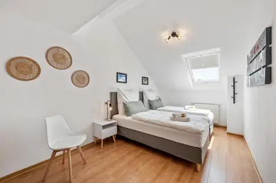 Ein Bett oder Betten in einem Zimmer der Unterkunft Fewo Waldegg, gemütliche Unterkunft für 5 Gäste