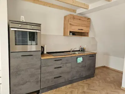 Küche/Küchenzeile in der Unterkunft Rooftop Retreat Heilbronn
