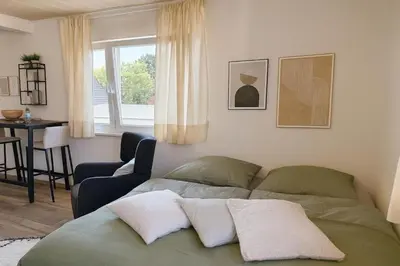 Ein Sitzbereich in der Unterkunft Schön Wohnen in St Leon Rot