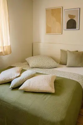 Ein Bett oder Betten in einem Zimmer der Unterkunft Schön Wohnen in St Leon Rot