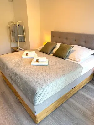 Ein Bett oder Betten in einem Zimmer der Unterkunft NIRO I Design City Apartment, Neubau, Dachterrasse, Parkplatz, Top Lage
