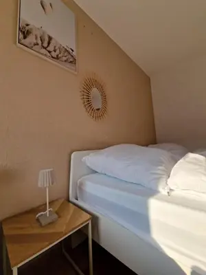 Ein Bett oder Betten in einem Zimmer der Unterkunft Dorey Home HN3 - WLAN - Cozy
