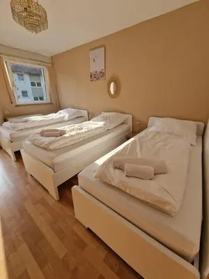 Ein Bett oder Betten in einem Zimmer der Unterkunft Dorey Home HN3 - WLAN - Cozy