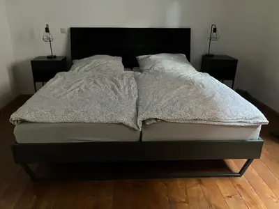 Ein Bett oder Betten in einem Zimmer der Unterkunft Ferienwohnung im Denkmal