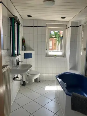 Ein Badezimmer in der Unterkunft Ferienwohnung im Denkmal