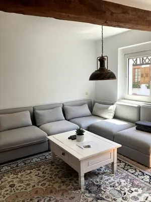Ein Sitzbereich in der Unterkunft Ferienwohnung im Denkmal