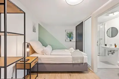 Ein Bett oder Betten in einem Zimmer der Unterkunft Sali Homes - Neckarwestheim - Basic Home