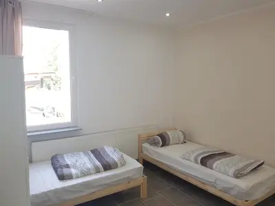 Ein Bett oder Betten in einem Zimmer der Unterkunft Bockstalstr 59a 10b