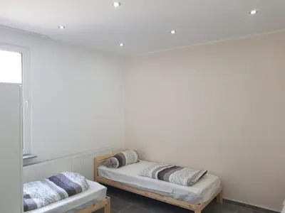Ein Bett oder Betten in einem Zimmer der Unterkunft Bockstalstr 59a 10b