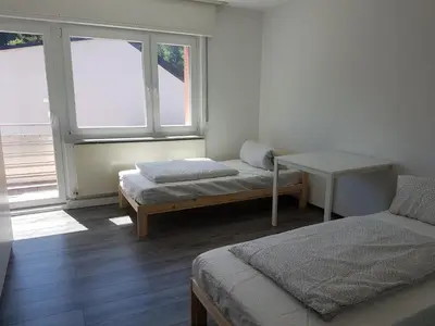 Ein Bett oder Betten in einem Zimmer der Unterkunft Bockstalstr 59a 20a