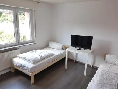 Ein Bett oder Betten in einem Zimmer der Unterkunft Bockstalstr 59a 20b