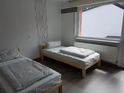 Ein Bett oder Betten in einem Zimmer der Unterkunft Bockstalstr 59a 20b