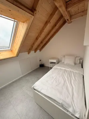 Ein Bett oder Betten in einem Zimmer der Unterkunft Neues, stilvolles Loft inmitten der Weinberge
