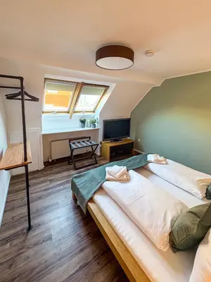 Ein Bett oder Betten in einem Zimmer der Unterkunft Wohnen in der Altstadt - Wohnungen und Studio