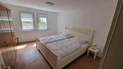 Ein Bett oder Betten in einem Zimmer der Unterkunft Ferienwohnung Forchtenberg