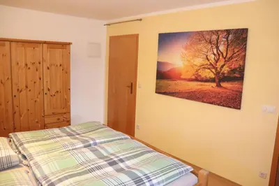 Ein Bett oder Betten in einem Zimmer der Unterkunft Ferienwohnung Pimer