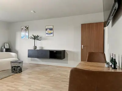 Ein Sitzbereich in der Unterkunft rohrerLiving #2 - Natur pur, Balkon und Panorama