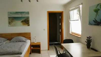 Ein Bett oder Betten in einem Zimmer der Unterkunft Kleiner Elefant