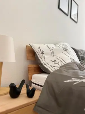 Ein Bett oder Betten in einem Zimmer der Unterkunft Altes Pfarrhaus Amorbach
