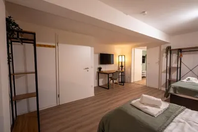 Ein Bett oder Betten in einem Zimmer der Unterkunft Übernachten im Kulturdenkmal - Weinort
