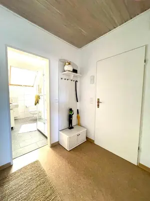 Ein Bett oder Betten in einem Zimmer der Unterkunft -Am Pfühlpark- Ferienwohnung