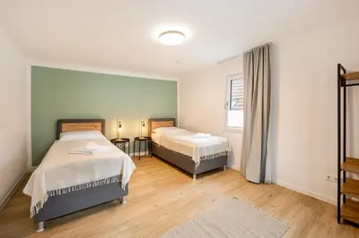 Ein Bett oder Betten in einem Zimmer der Unterkunft CharmÖHR Homes