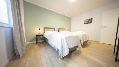 Ein Bett oder Betten in einem Zimmer der Unterkunft CharmÖHR Homes