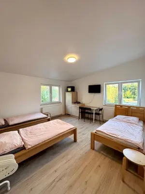 Ein Bett oder Betten in einem Zimmer der Unterkunft Muskat