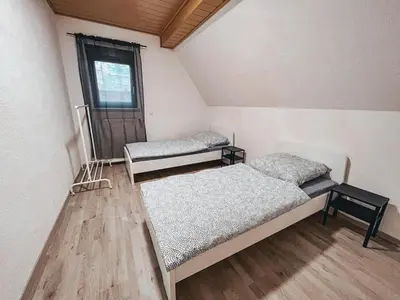 Ein Bett oder Betten in einem Zimmer der Unterkunft Neuhofen Stay