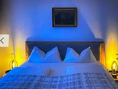 Ein Bett oder Betten in einem Zimmer der Unterkunft Ferienwohnung in Frankenthal